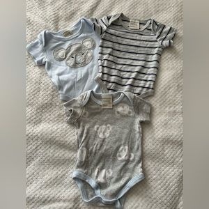 First Impressions onesie set